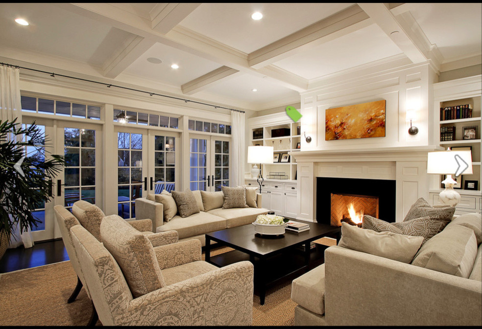 Inspiration for a medium sized traditional formal enclosed living room in Vancouver with white walls, dark hardwood flooring, a standard fireplace, a stone fireplace surround, no tv and feature lighting.