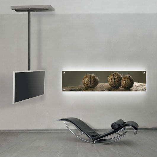 Diseño de salón abierto minimalista de tamaño medio sin chimenea con paredes grises, suelo de cemento y televisor colgado en la pared