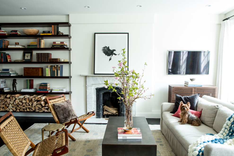 Living room - transitional open concept dark wood floor living room idea with white walls, a standard fireplace and a wall-mounted tv