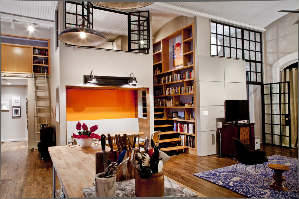 Idee per un soggiorno design aperto con libreria