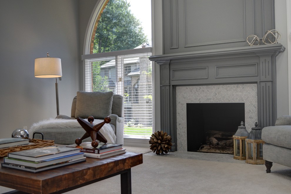 Large contemporary living room in Chicago with grey walls, carpet, a standard fireplace and a stone fireplace surround.
