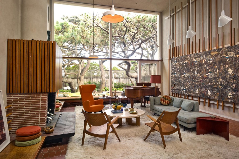 Living room - mid-century modern living room idea in San Francisco with a music area, beige walls, a standard fireplace and a brick fireplace