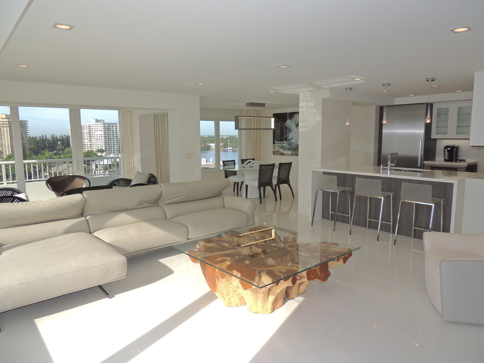 Photo of a medium sized contemporary open plan living room in Miami with white walls, porcelain flooring, no fireplace and no tv.
