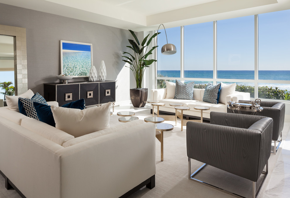Пример оригинального дизайна: открытая, парадная гостиная комната среднего размера в современном стиле с серыми стенами и белым полом без камина, телевизора