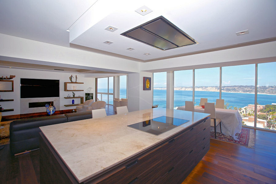 Inspiration for a beach style living room in San Diego with medium hardwood flooring.