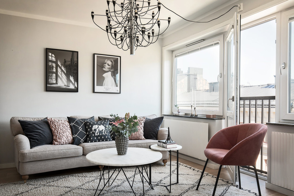 Inspiration för små minimalistiska vardagsrum, med grå väggar