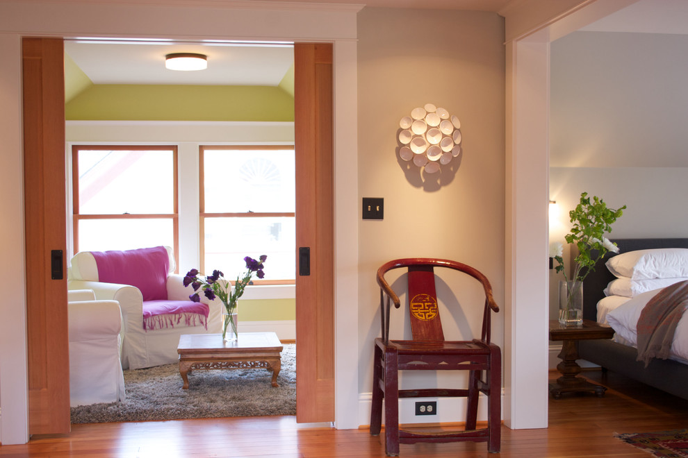 This is an example of a small traditional living room in Portland with green walls.