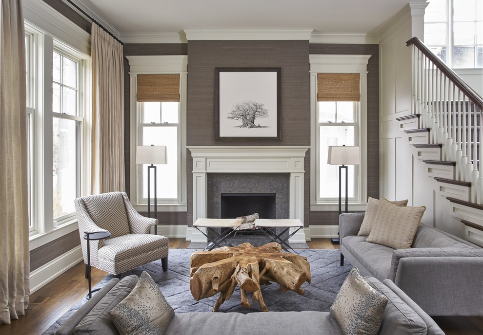 Inspiration for a mid-sized transitional formal and open concept dark wood floor and brown floor living room remodel with gray walls, a standard fireplace, a tile fireplace and no tv