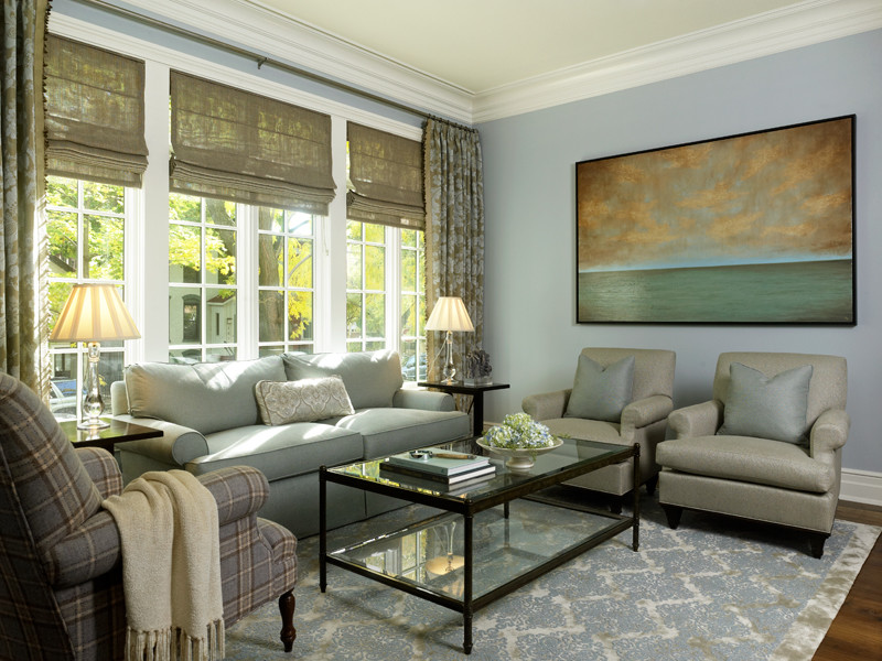 Immagine di un grande soggiorno classico con sala formale, pareti blu, pavimento in legno massello medio, nessun camino e nessuna TV
