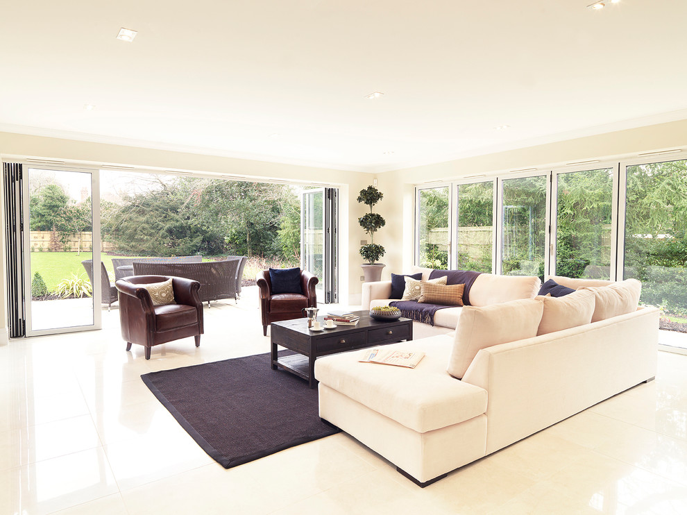 Example of a large transitional living room design in Hampshire