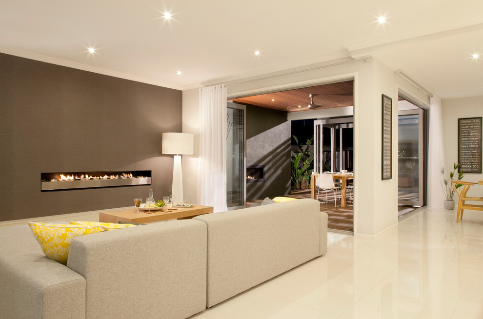 Photo of a contemporary open plan living room in Melbourne with a ribbon fireplace.