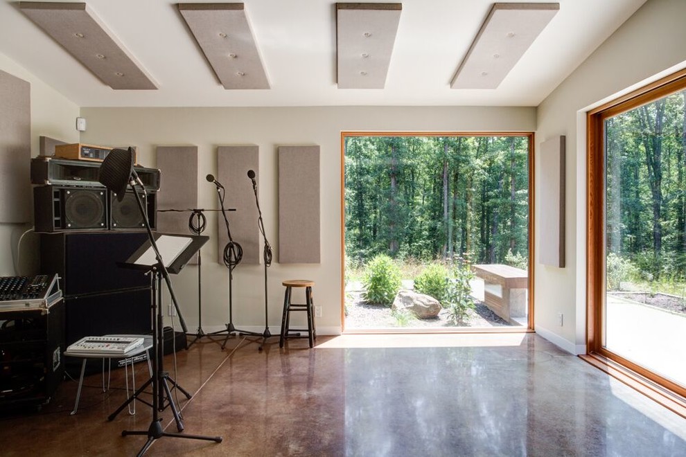 Inspiration för ett mellanstort funkis separat vardagsrum, med ett musikrum, grå väggar, betonggolv och beiget golv