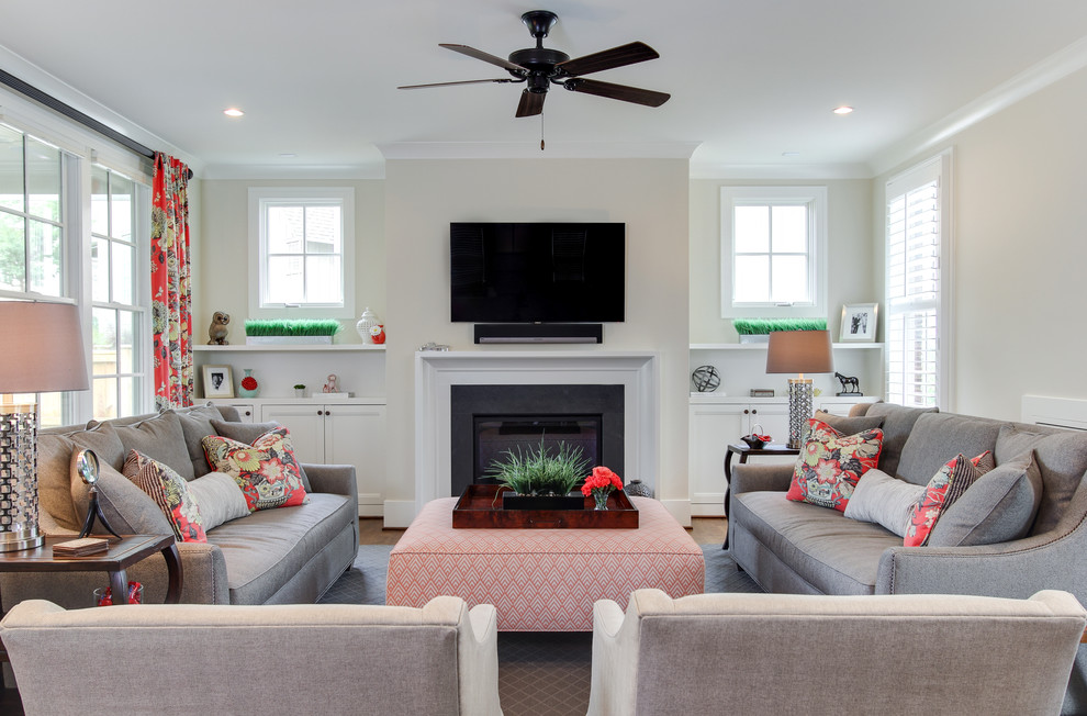 Living room - transitional living room idea in Raleigh with a standard fireplace