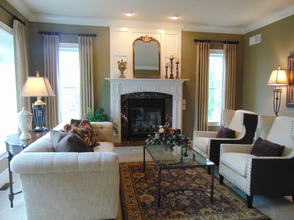 Photo of a medium sized classic open plan living room in Philadelphia with green walls, carpet, a standard fireplace, a stone fireplace surround, no tv and beige floors.