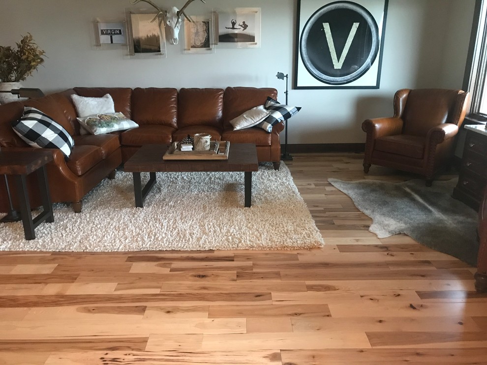Large southwest open concept light wood floor living room photo in Other with white walls, no fireplace and no tv