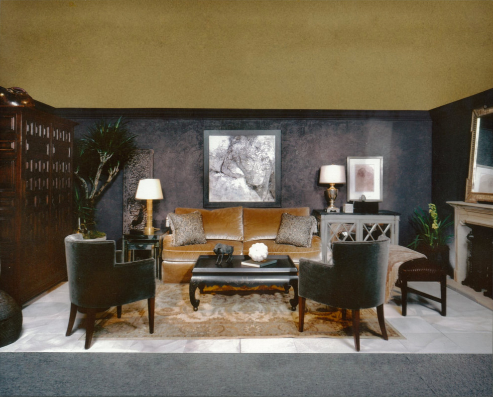 На фото: парадная, изолированная гостиная комната среднего размера в восточном стиле с серыми стенами, полом из керамогранита, стандартным камином, фасадом камина из камня и серым полом без телевизора