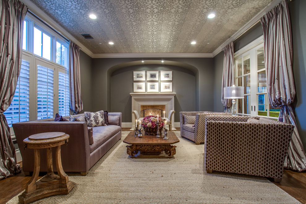 Transitional enclosed dark wood floor living room photo in Dallas with gray walls