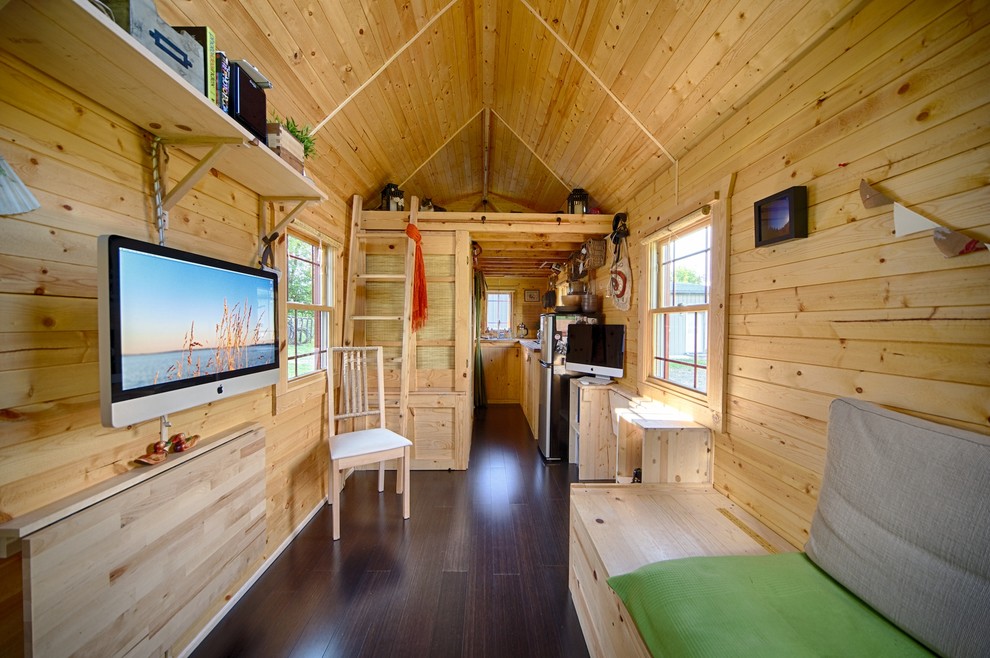 Inspiration for a small rustic living room remodel in Seattle with a wall-mounted tv