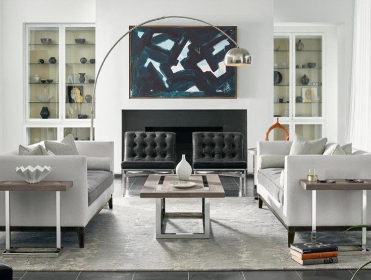 Example of a mid-sized trendy formal and enclosed gray floor and slate floor living room design in New York with white walls, a standard fireplace, a metal fireplace and no tv