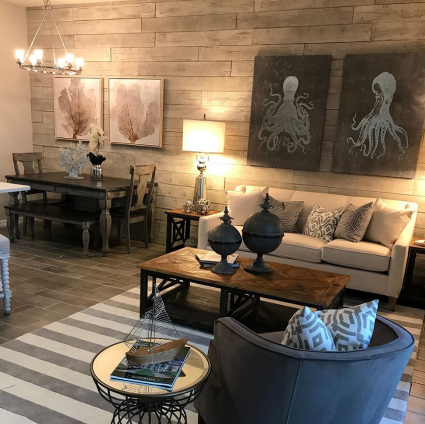Mid-sized eclectic open concept vinyl floor and brown floor living room photo in Orange County with beige walls