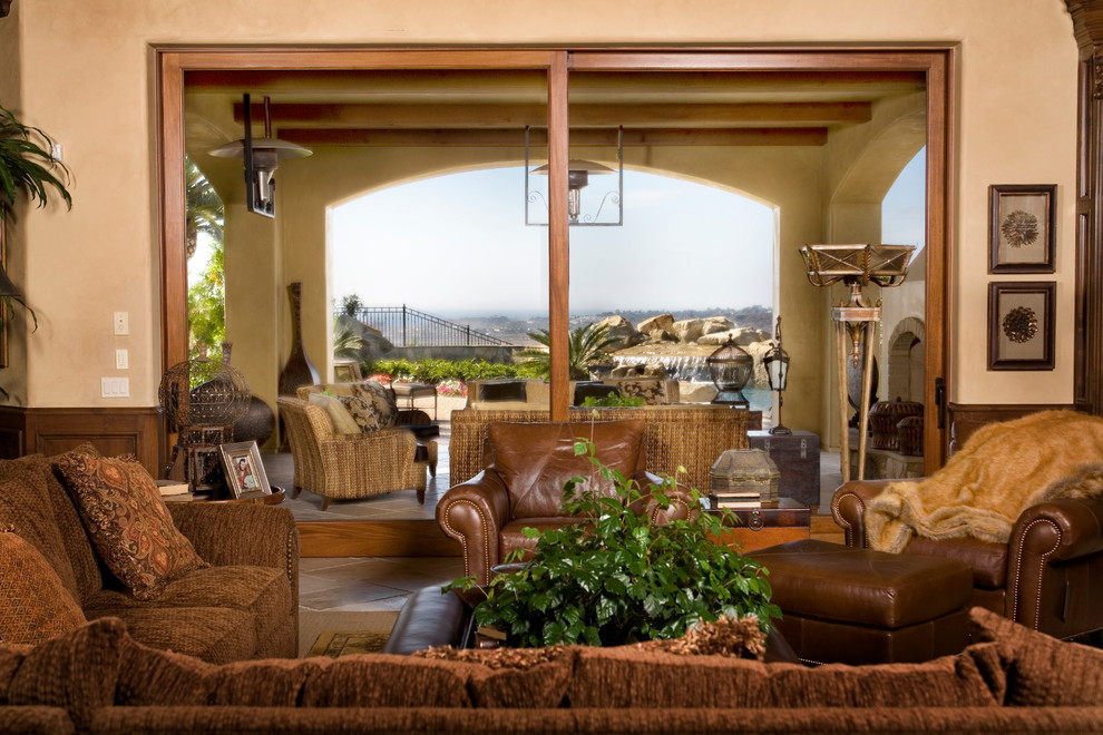 Living room - large traditional formal and enclosed living room idea in San Diego with beige walls