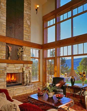 Inspiration for a large classic open plan living room in Albuquerque with beige walls, a standard fireplace and a stone fireplace surround.