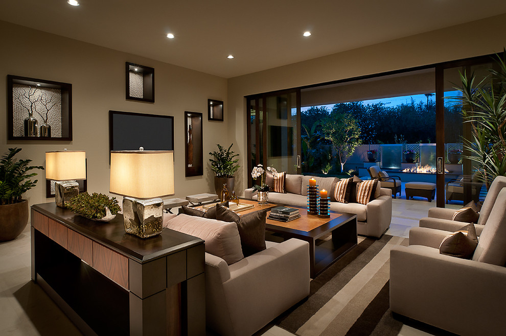 Design ideas for a large contemporary living room in Phoenix with beige walls and feature lighting.