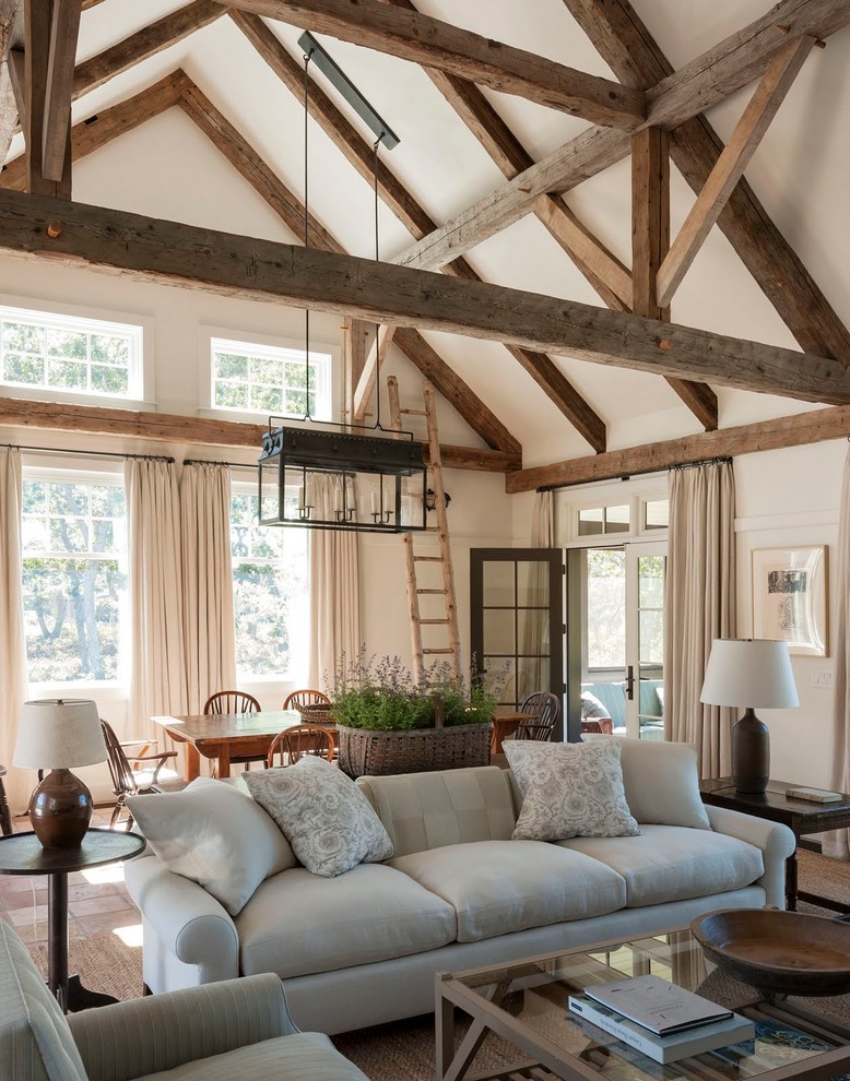 Design ideas for a country open plan living room in Boston with white walls.