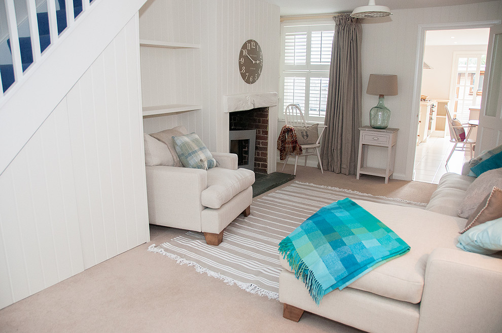 Example of a beach style living room design in Kent