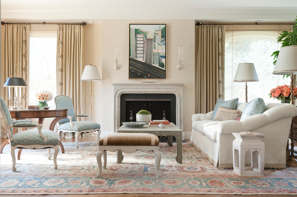 Inspiration for a traditional formal living room curtain in San Francisco with beige walls and a standard fireplace.