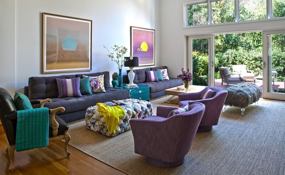 Example of a mid-sized eclectic enclosed light wood floor living room design in Los Angeles with white walls and no fireplace