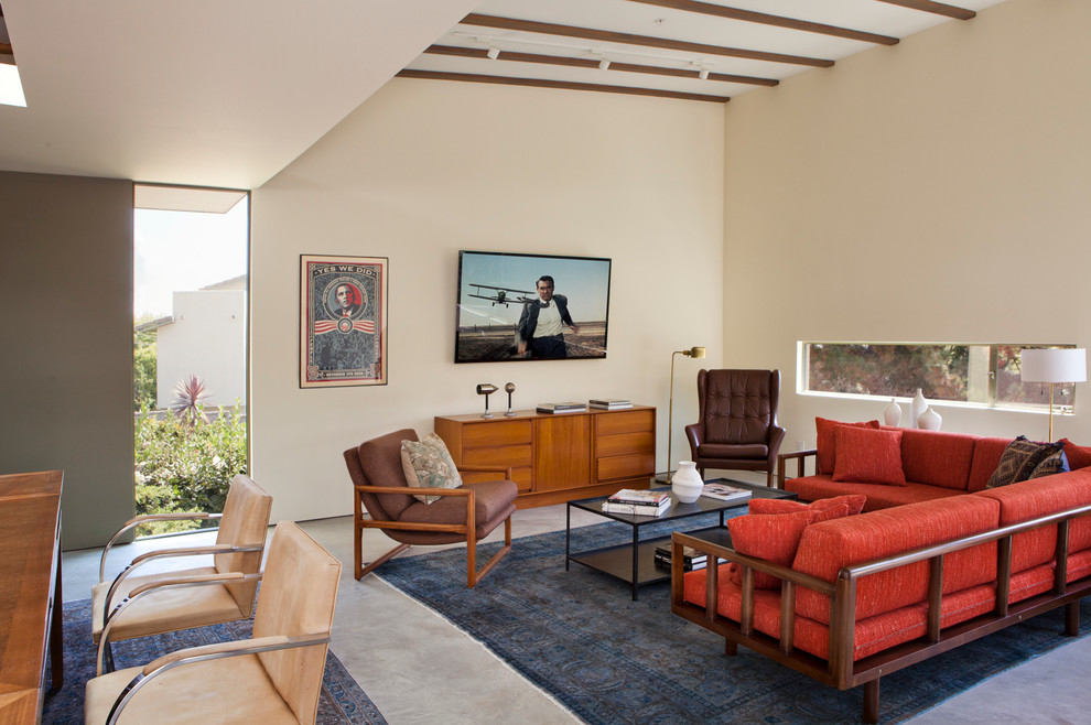 Inspiration for a contemporary open concept living room remodel in Los Angeles with beige walls