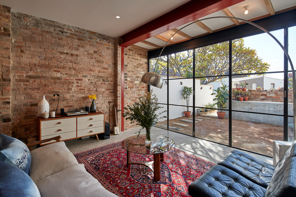 Modernes Wohnzimmer mit Betonboden und grauem Boden in Sydney