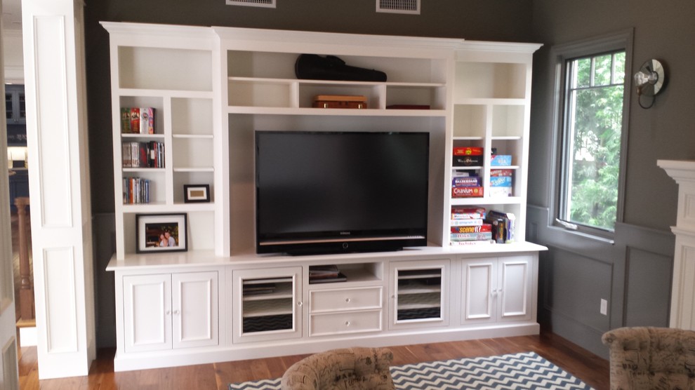 Example of a large classic living room design in Los Angeles with a tv stand
