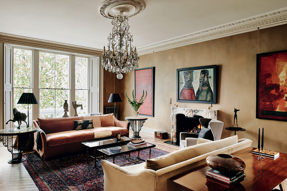 Medium sized classic enclosed living room in London with brown walls and a standard fireplace.