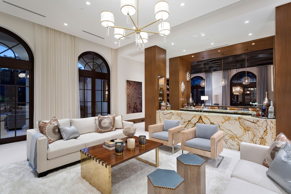 Mediterranean open plan living room in Orlando with white walls and white floors.