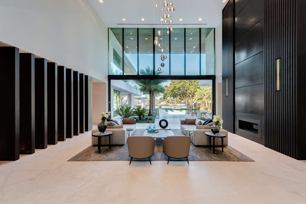 Idée de décoration pour un salon design ouvert avec une salle de réception, une cheminée ribbon et un sol blanc.