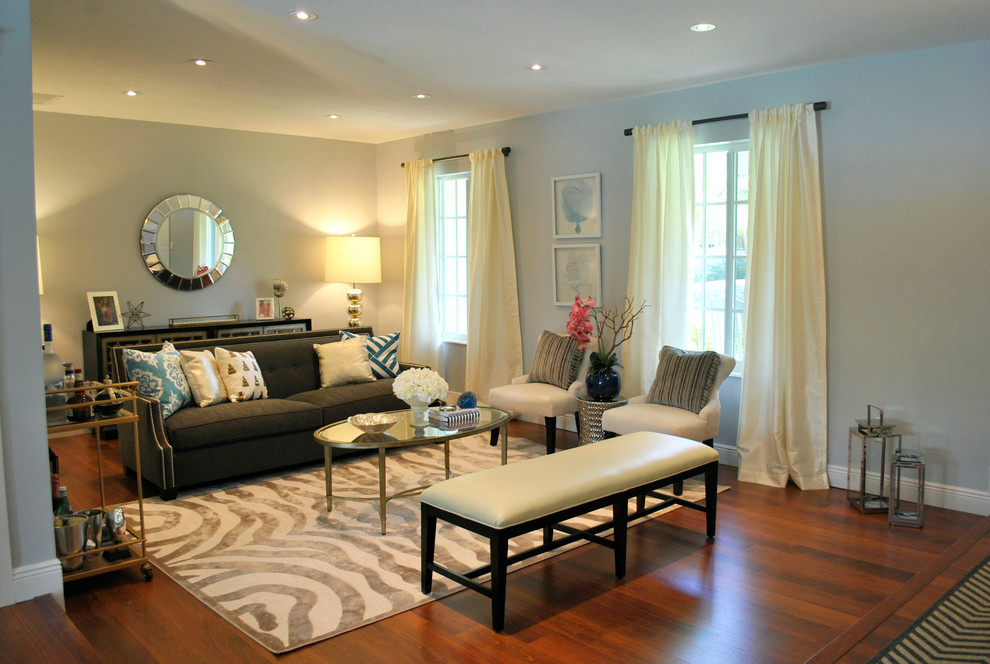 Immagine di un soggiorno boho chic di medie dimensioni e aperto con sala formale e pareti grigie