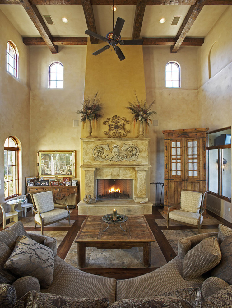 Example of a tuscan living room design in Austin