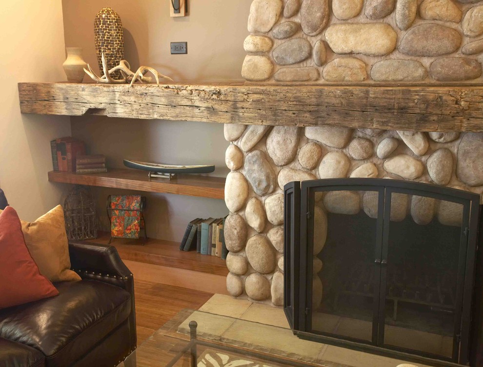 Mid-sized mountain style open concept bamboo floor and brown floor living room photo in San Francisco with brown walls, a standard fireplace and a stone fireplace