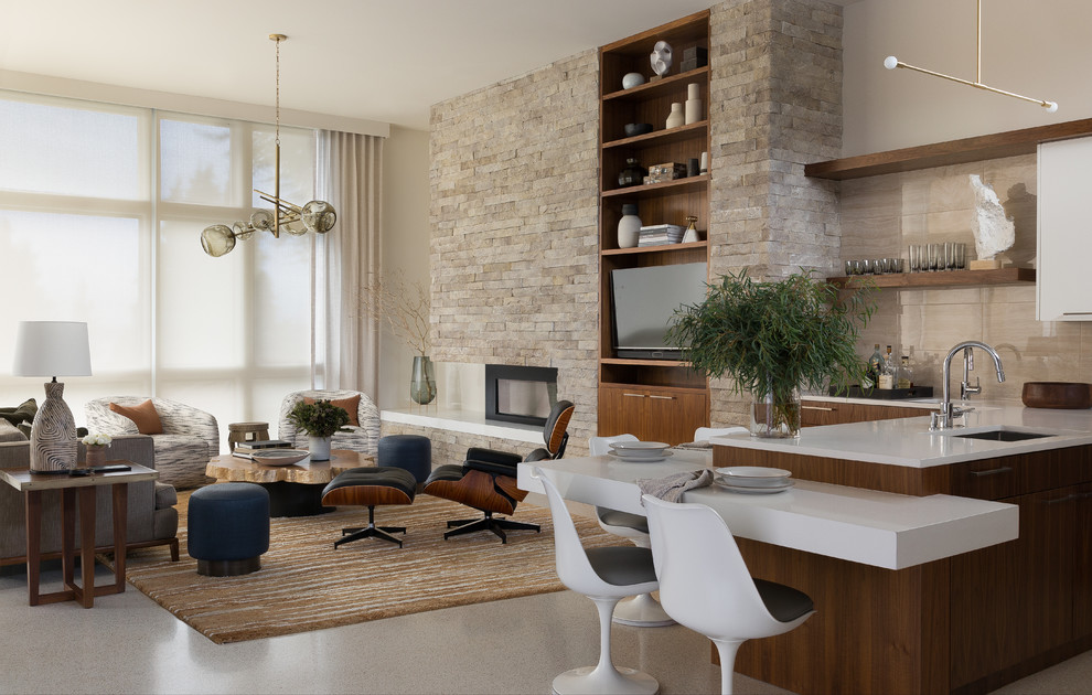 Example of a trendy open concept beige floor living room design in Seattle with beige walls, a ribbon fireplace, a stone fireplace and a wall-mounted tv