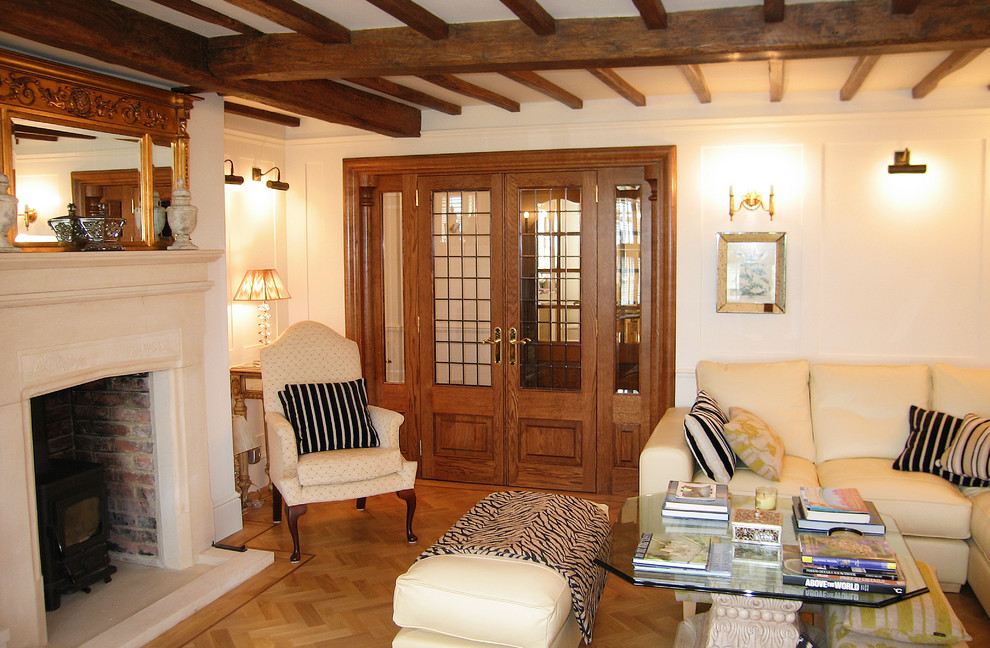 Panelling and joinery in a unique country house Traditional Living Room Kent by Mounts