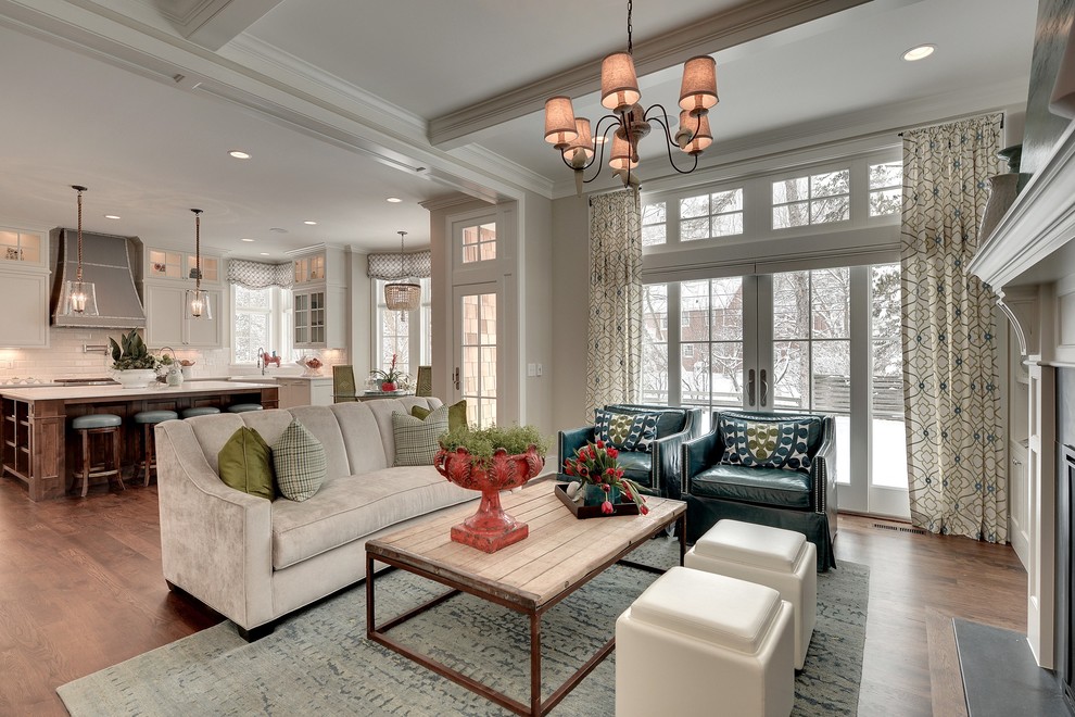 Example of a mid-sized classic open concept medium tone wood floor living room design in Minneapolis