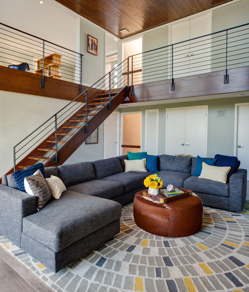 Trendy light wood floor living room photo in Phoenix with gray walls, no fireplace and no tv