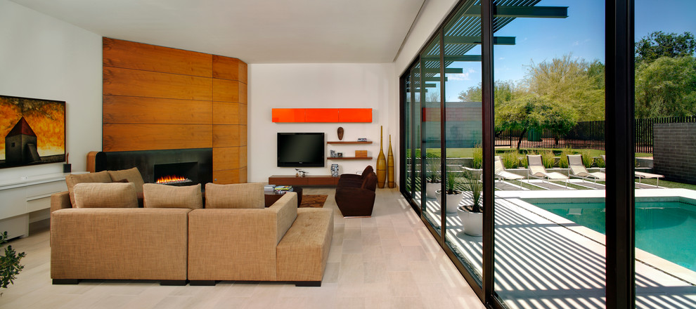 Идея дизайна: гостиная комната в стиле модернизм с угловым камином