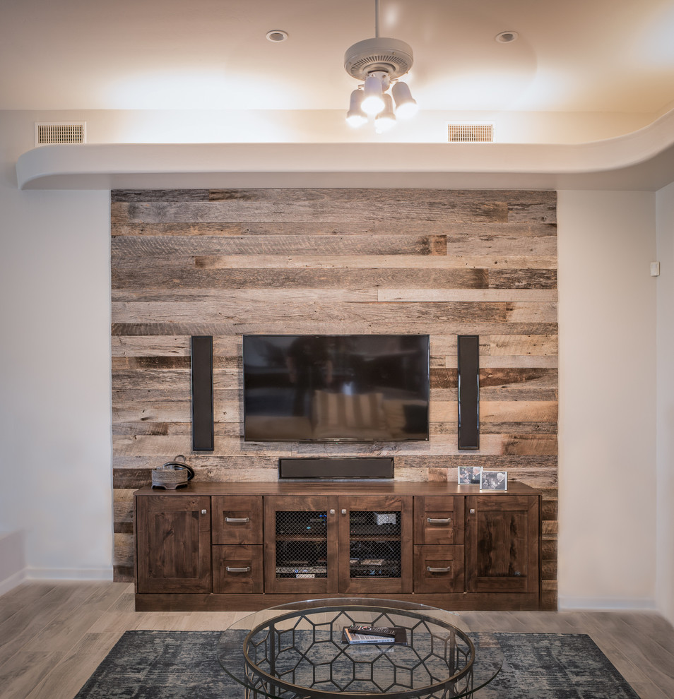This is an example of a medium sized rustic formal open plan living room in Minneapolis with beige walls, light hardwood flooring, no fireplace and a wall mounted tv.