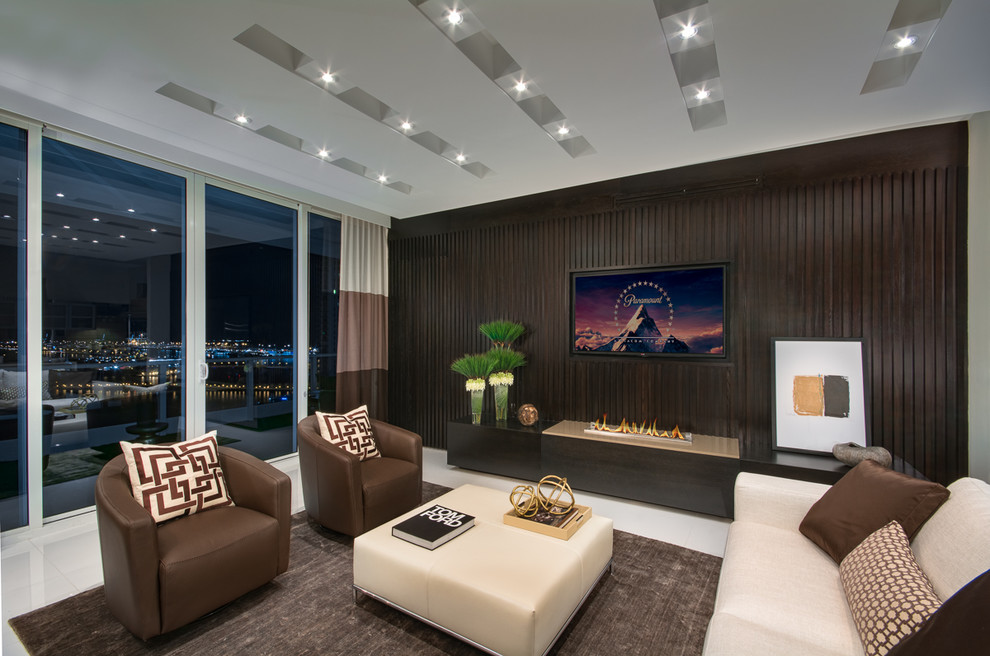 Example of a large trendy formal and enclosed porcelain tile living room design in Miami with beige walls, a ribbon fireplace and a media wall