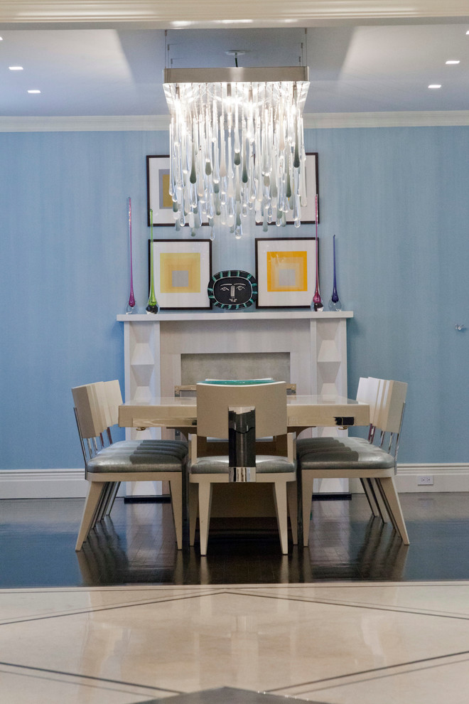 Inspiration for a contemporary dining room in New York with blue walls.