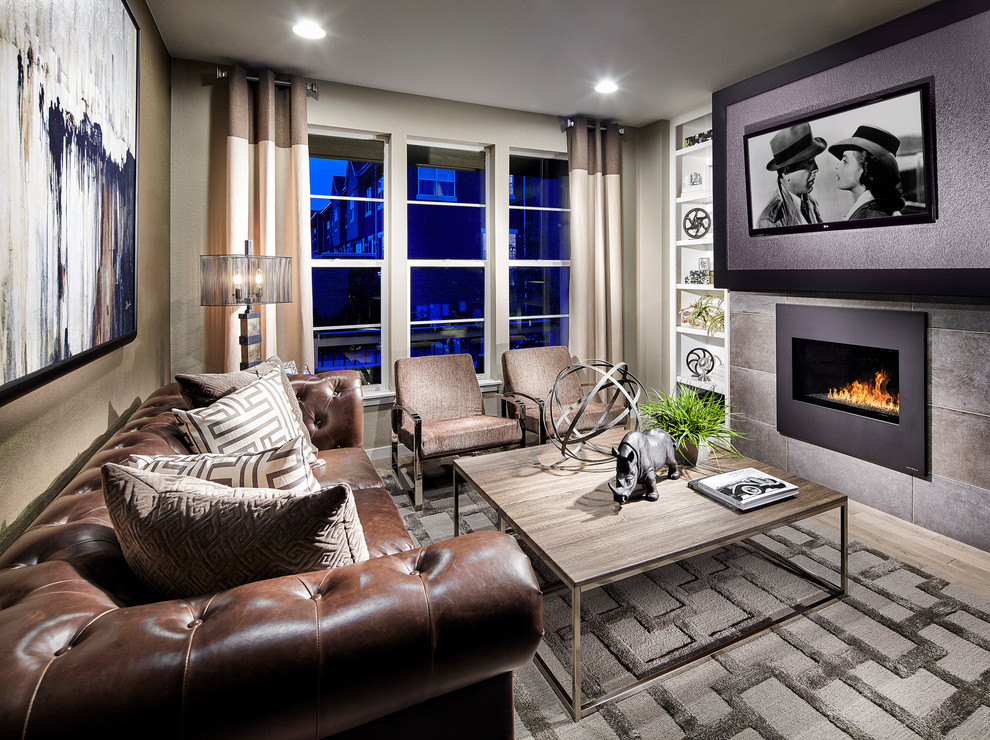 Medium sized industrial mezzanine living room in Denver with beige walls, light hardwood flooring, a ribbon fireplace, a tiled fireplace surround and a wall mounted tv.