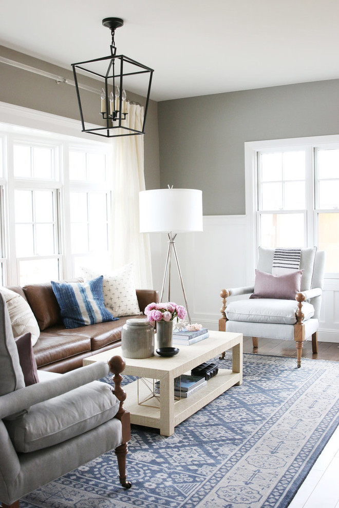 Inspiration for a mid-sized transitional enclosed dark wood floor living room remodel in Salt Lake City with gray walls